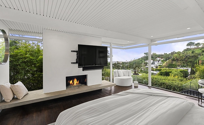 Primary bedroom of a Sunset Strip Mid Century home with stunning views